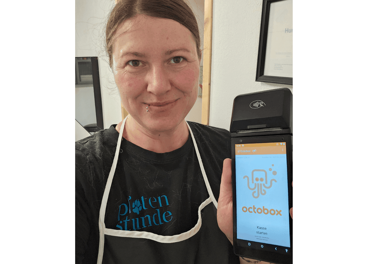 Smiling woman holding a smartphone with the orange "octobox" logo prominently displayed.